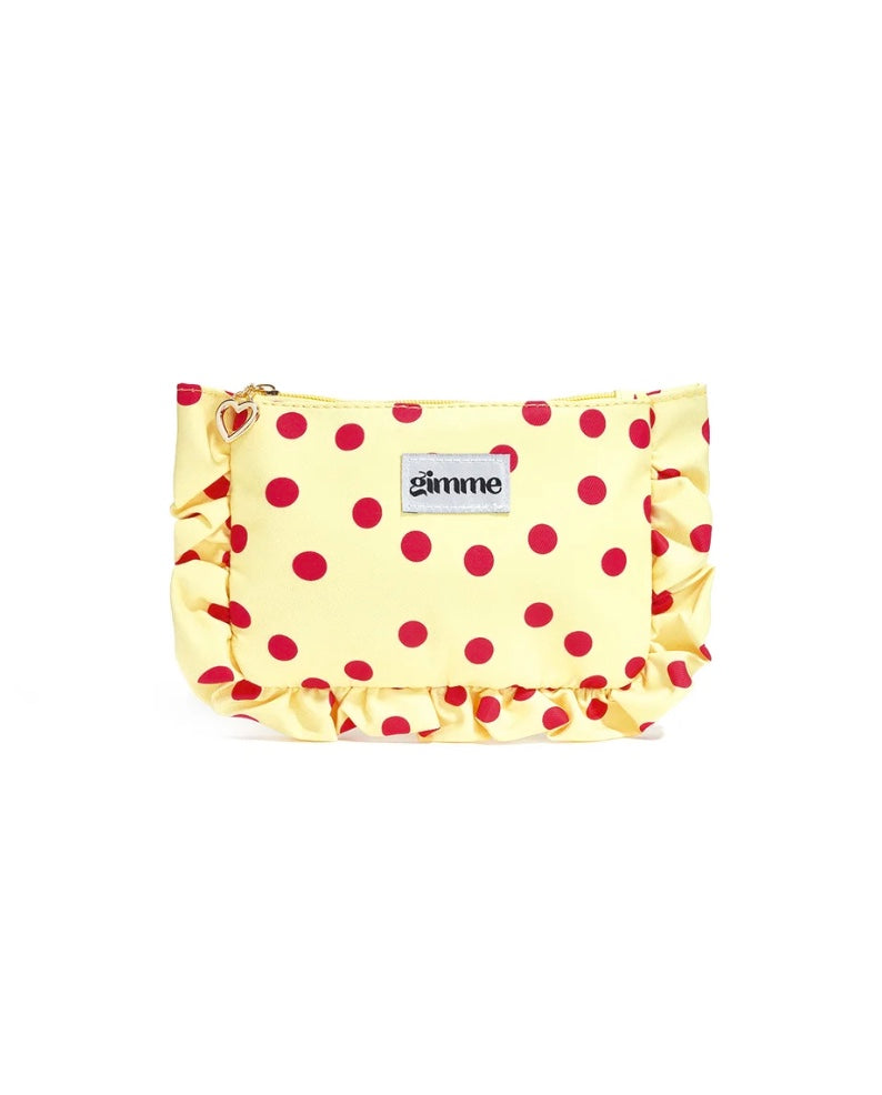 Licht geel toilettasje met polka dots